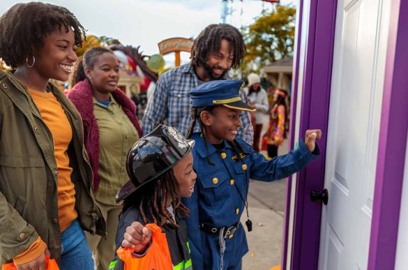 a group of people looking at a door