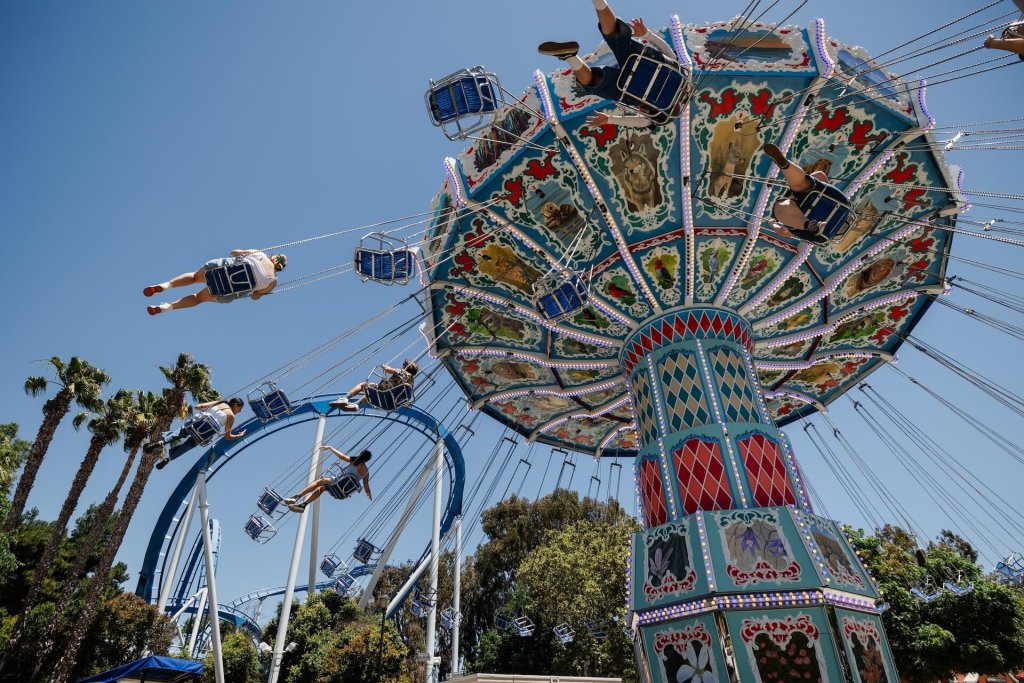 Guests on a flying trapeze ride at California's Great America, a top thing to do in Santa Clara.