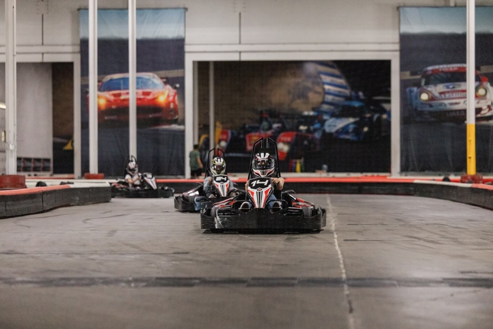 Guests race in race cars at K1 Speed Racing in Santa Clara, one of the best things to do.