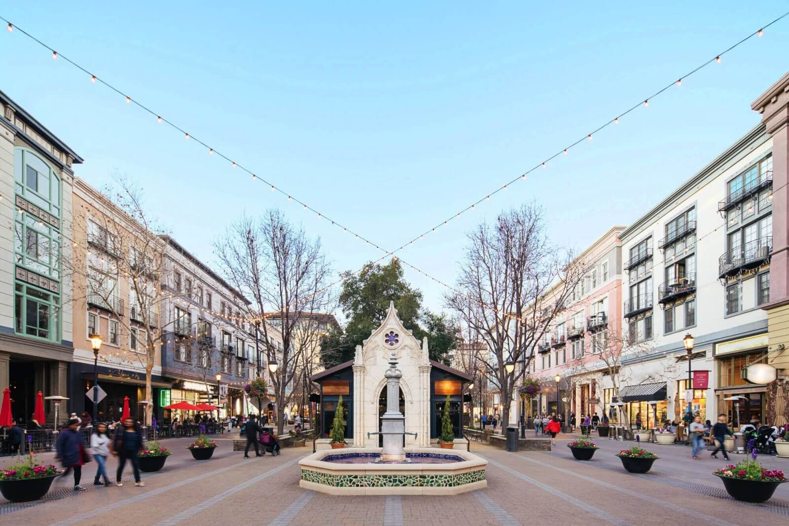 One of the best things to do near Santa Clara, guests walk amongst Santana Row.